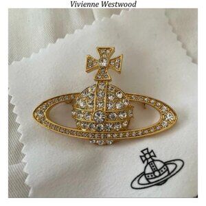 Vivienne Westwood iridescent rainbow star orb gold bracelet